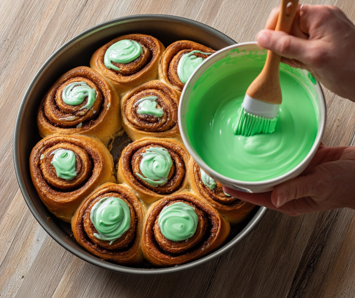 Rainbow Sprinkle Cinnamon Rolls with Green Icing
