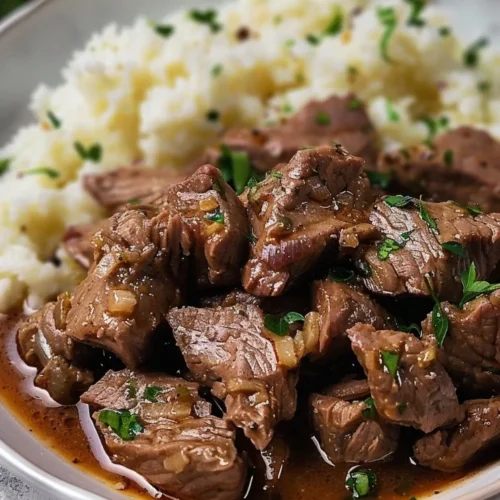 Delicious easy beef tips served with vegetables and a savory sauce