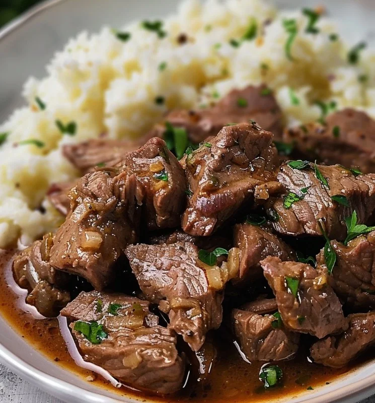 Delicious easy beef tips served with vegetables and a savory sauce