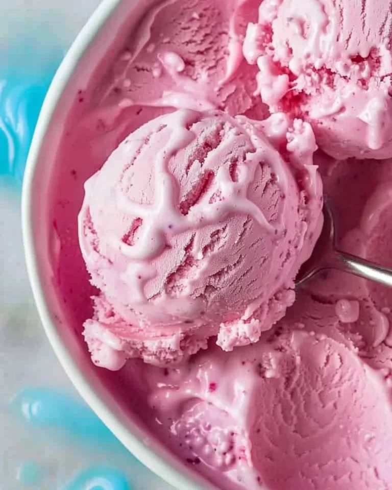 Bowl of vibrant Kool Aid Ice Cream ideal for summer desserts