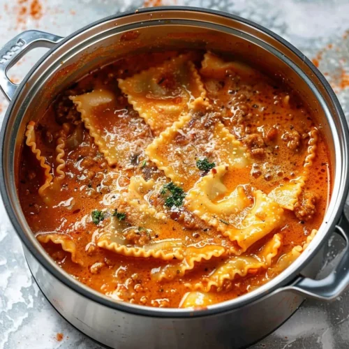 Bowl of Instant Pot lasagna soup garnished with fresh herbs