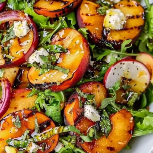 Delicious summer grilled peach salad with fresh ingredients and vibrant colors