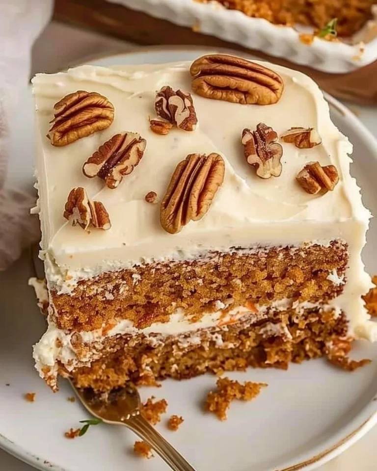 Delicious homemade carrot cake sheet pan topped with cream cheese frosting
