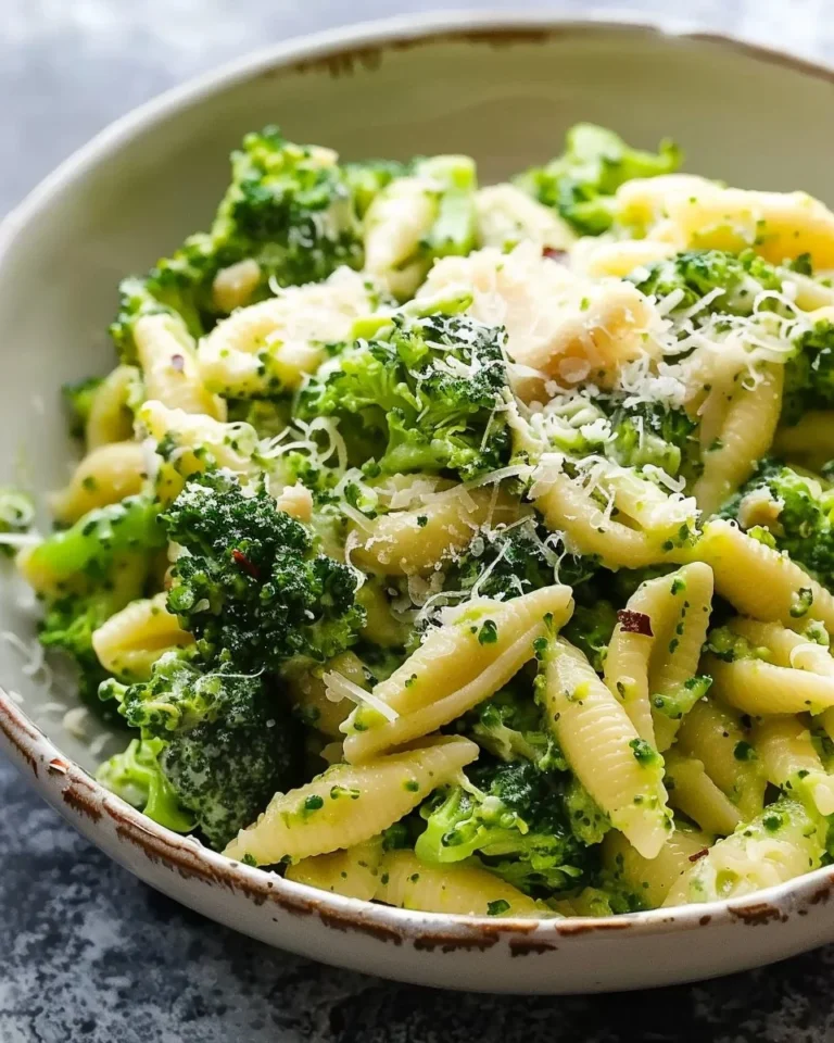 Cavatelli pasta served with sautéed broccoli in a savory dish