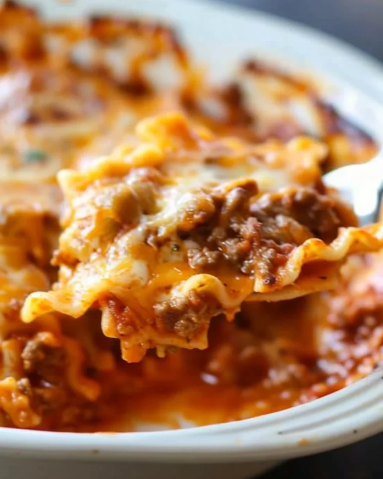 A plate of Hamburger Helper Lasagna served with a side salad