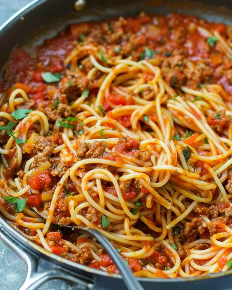One-Pot Spaghetti with Meat Sauce in a pot ready to serve