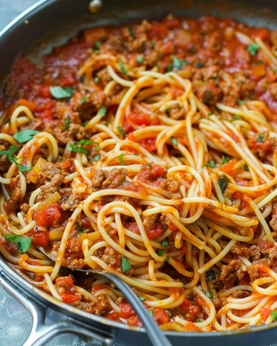 One-Pot Spaghetti with Meat Sauce in a pot ready to serve