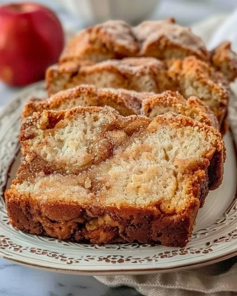 Delicious Apple Bread with Cinnamon Swirl on a wooden table
